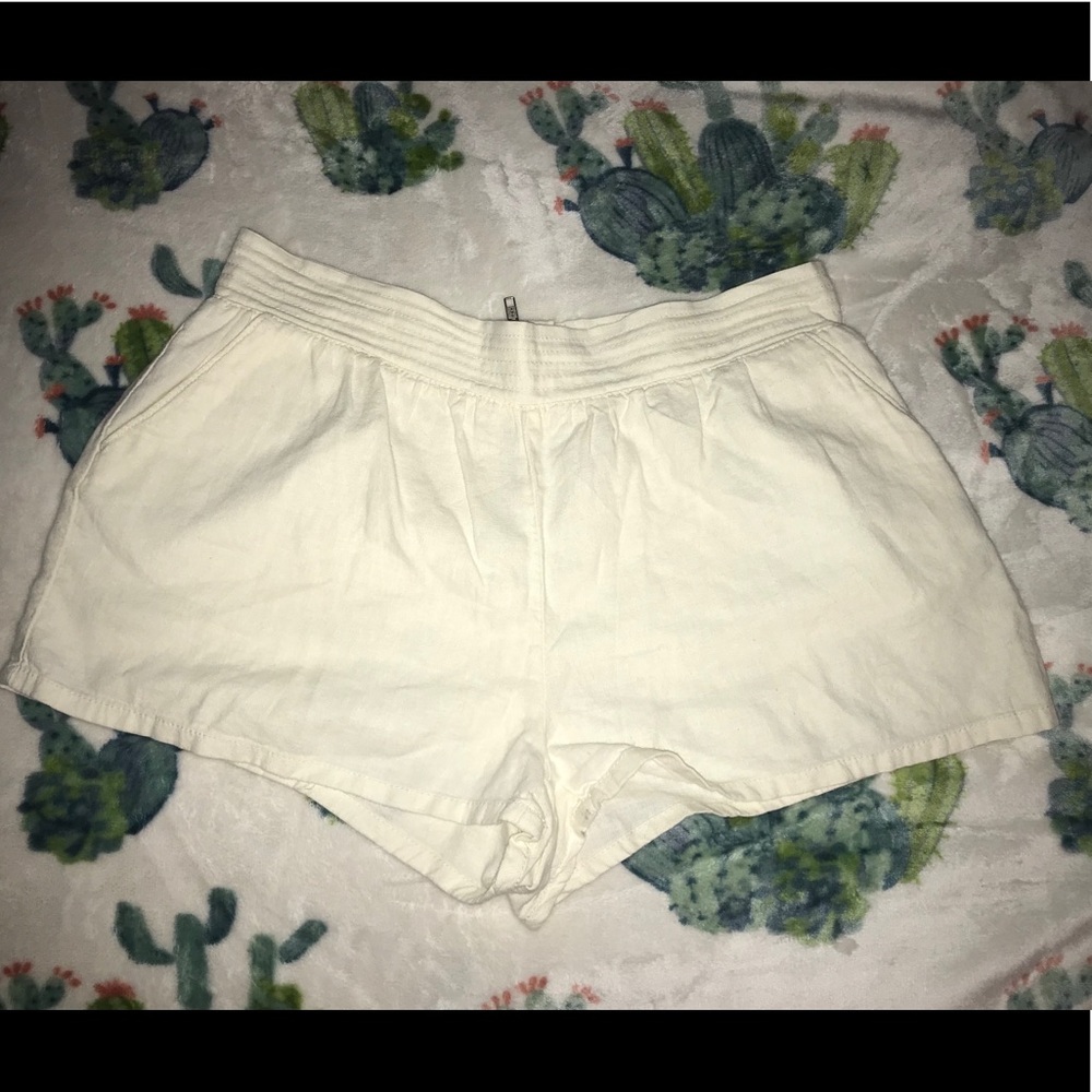 White zip up cloth shorts